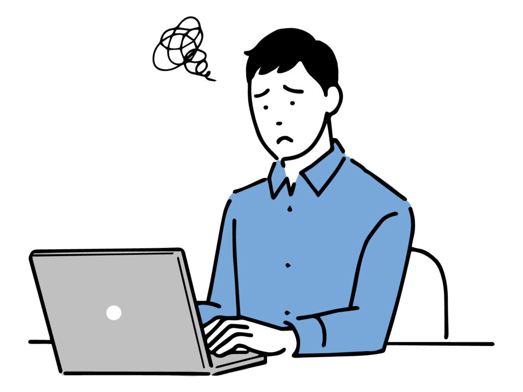 パソコンをみてがっかりしている男性